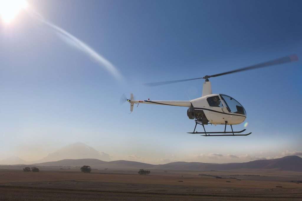 Helicopter flying close to ground
